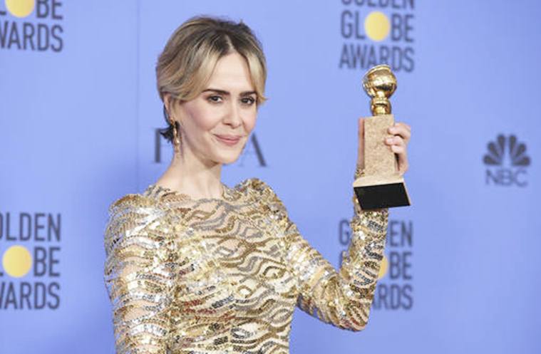 Sarah Paulson poses in the press room with the award for best performance by an actress in a limited series or a motion picture made for television for "The People v. O.J. Simpson: American Crime Story" at the 74th annual Golden Globe Awards at the Beverly Hilton Hotel on Sunday, Jan. 8, 2017, in Beverly Hills, Calif. (Photo by Jordan Strauss/Invision/AP)
