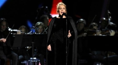 Adele fumbles during Grammy 2017 tribute to George Michael. Curses and starts again
