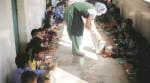 Boy falls in pot of hot curry while standing in midday meal queue