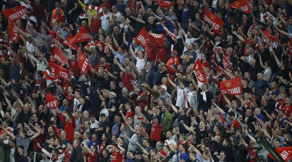 Manchester United fans celebrate Europa League triumph after tragedy