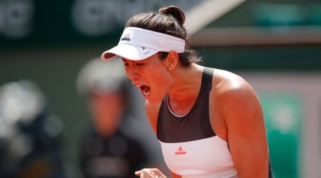 French Open 2017: Garbine Muguruza begins title defence by taking out Francesca Schiavone
