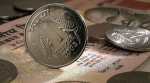Rupee appreciates 10 paise against dollar to 64.49