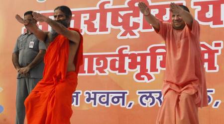Yoga Guru Ramdev, Gujarat Chief Minister Vijay Rupani participate in International Yoga Day celebrations