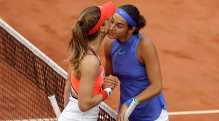 French Open 2017: Kiss on the cheek as Caroline Garcia beats Alize Cornet in all-French battle