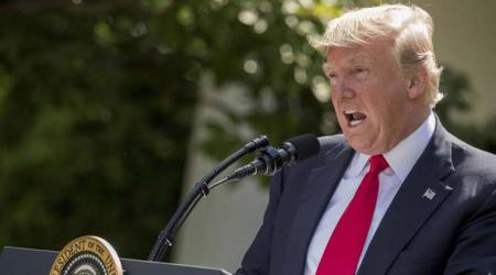 Paris withdrawal sets business world at odds with Donald Trump