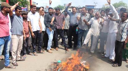 Congress workers burn Pakistan PM’s poster in Rajkot to protest Indo-Pak cricket match