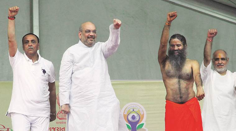 International yoga day 2017, international yoga day, world yoga day, yoga day celebrations, congress slams yoga day, yoga day tweets, baba ramdev, amit shah
