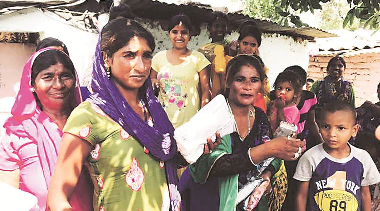 sanitary napkins, slums, india news, indian express news