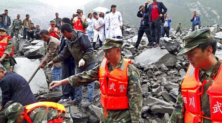 Nine bodies recovered after landslide buries scores in China