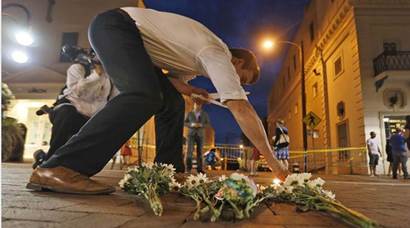 A day after Charlottesville violence, US pays tribute to victims