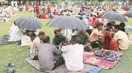 With prayer on lips, Gurmeet Ram Rahim’s followers pack roads, parks