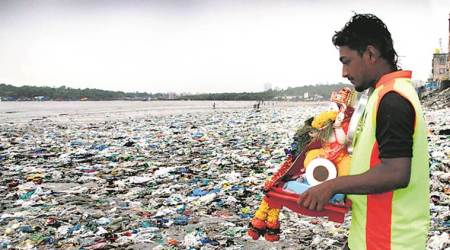 Ganesh Utsav: Activist starts cleaning Versova beach of immersion debris