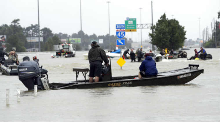 Hurricane Harvey, Texas, global warming effects, rainfall record, future hurricanes, heavy rainfall, climate science, warm air, warm seas, climate scientists, Arctic sea ice, jetstream, weather pattern changes, tropical system 