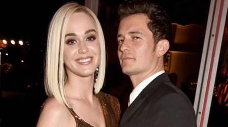Singer Katy Perry and Hollywood star Orlando Bloom get cosy at an event. Are they back together?