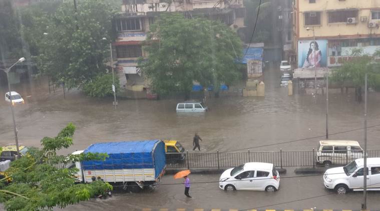 mumbai rains, mumbai rainfall, heavy rains mumbai, mumbai weather, mumbai flooding, mumbai photos, india news