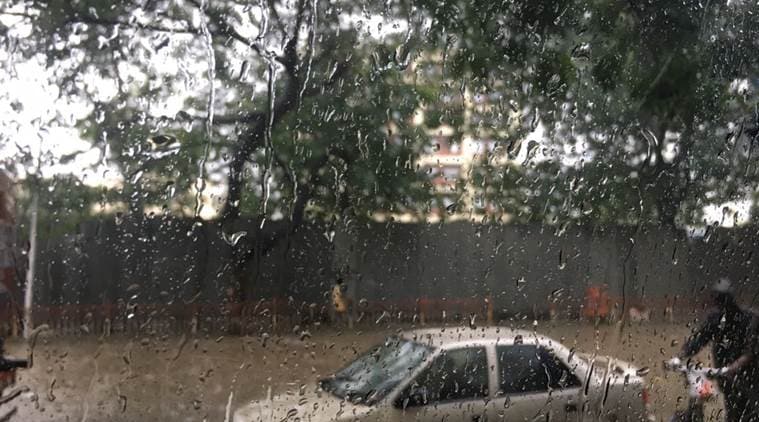 mumbai rains, mumbai rainfall, heavy rains mumbai, mumbai weather, mumbai flooding, mumbai photos, india news