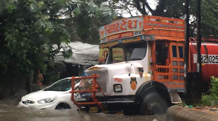 mumbai rains, mumbai rainfall, heavy rains mumbai, mumbai weather, mumbai flooding, mumbai photos, india news