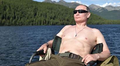 Vladimir Putin goes fishing! Photos of Russian President taking a dip in southern Siberia