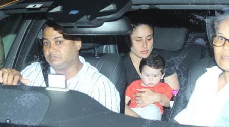 Taimur is happily sitting like a boss in mother Kareena Kapoor Khan’s lap. See photos