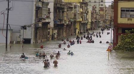 After Irma, tourists party and Cubans take a dip in flooded streets