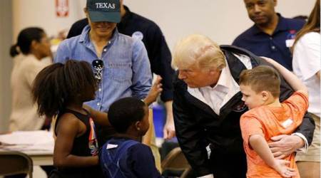 Donald Trump greeted warmly by storm victims at Houston relief center
