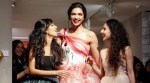 Deepika Padukone looks radiant in red and white as Gauri And Nainika Karan's showstopper