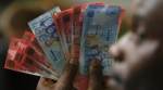 West African leaders plan shared currency by 2020