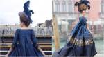 This corporate woman is living her French court fantasies by wearing handmade vintage gowns to work