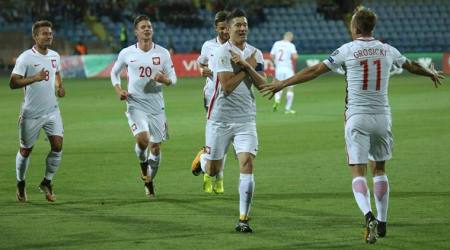 Robert Lewandowski hat-trick puts Poland on brink of 2018 World Cup