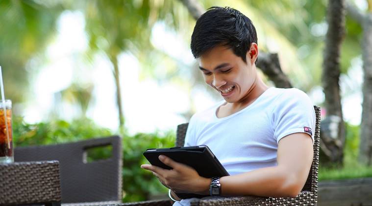 social media, indians on social media, social media while holidaying, social media obsessed, conecting through social media, social media addict, indian epxress, indian express news