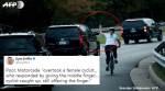 Woman cyclist gestures at US Prez Donald Trump as motorcade passes; photo goes viral
