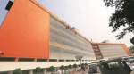 Kesariya is the new black: A day in the life of workers painting the UP CM’s secretariat building