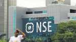 Algorithmic trading case: Income Tax department swoops on former NSE bosses, brokers