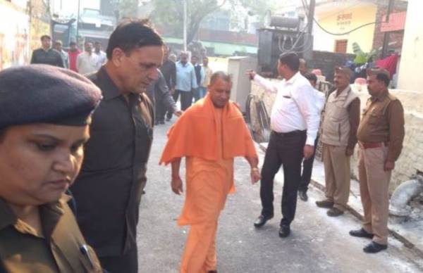 Uttar Pradesh Chief Minister Yogi Adityanath arrives at a polling station in Gorakhpur to cast his vote.