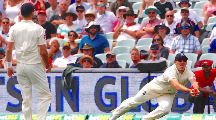 Craig Overton takes a diving catch to dismiss Tim Paine at Adelaide on Day 4 of second Ashes Test