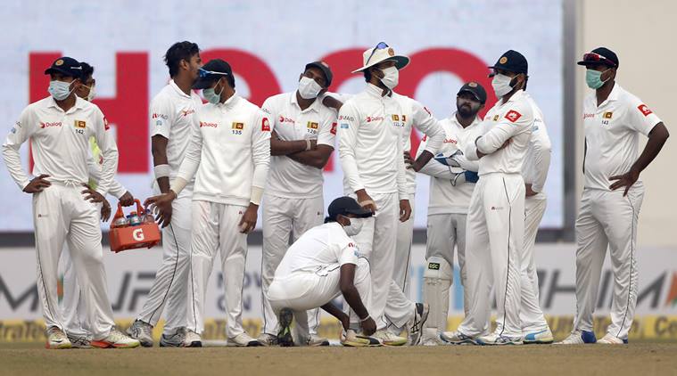 Sri Lank players celebrate a fall of wicket on Day 4 of third Test against India
