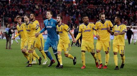 Juventus beats Olympiakos 2-0 to advance in Champions League