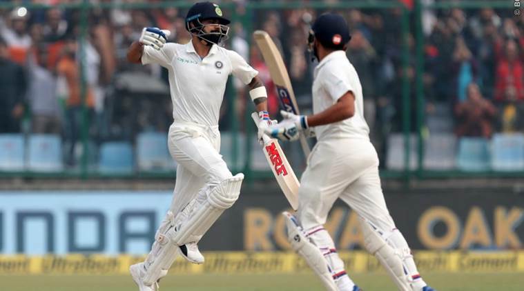 Virat Kohli celebrates following his sixth double century