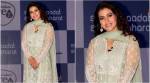 Kajol makes for a pretty picture in this beautiful pista green Anita Dongre suit