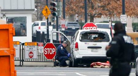 White House on lockdown after car rams into security barrier