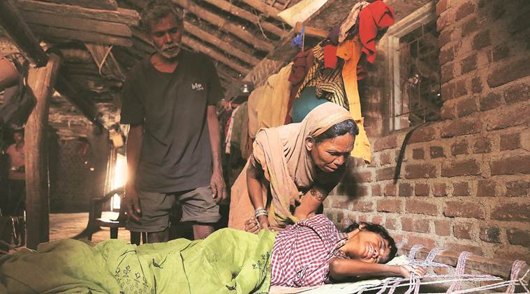 As the cot’s ropes bite into her infected back, Ravita breaks down. (Express photo/Prashant Nadkar)