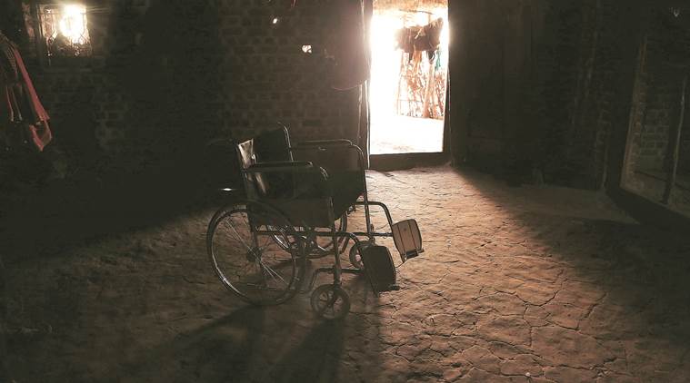 The wheelchair lies abandoned as it is of no use in the hilly village and Ravita is in too much pain to sit up. (Express photo/Prashant Nadkar)
