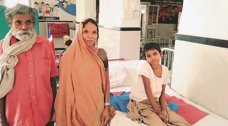 Ravita with her parents in a Mumbai hospital in February. (Express photo/Prashant Nadkar)