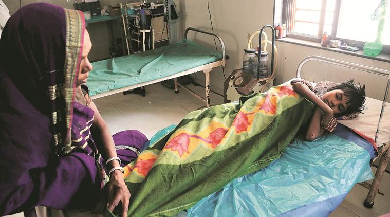 Ravita with her mother at Dhadgaon Rural Hospital. (Express photo/Prashant Nadkar)