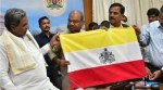 Siddaramaiah unveils proposed state flag for Karnataka, calls it 'sign of Kannadiga pride'