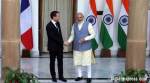 PM Modi calls for solar share increase in energy mix; Macron pledges loans for solar projects