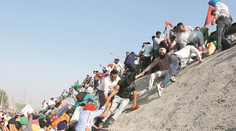 As police blocked roads, teachers found an ‘alternative’ way to reach the protest venue in Ludhiana Sunday. (Gurmeet Singh)