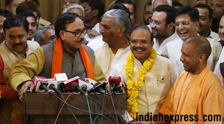 Uttar Pradesh Chief Minister Yogi Adityanath with BJP State President Mahendra Nath Pandey in Lucknow on Friday. (Express photo/Vishal Srivastav)