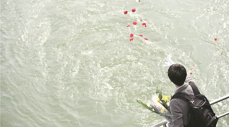Short of land, China launches first ship to bury people at sea