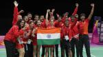 Nehwal helps India claim historic gold medal